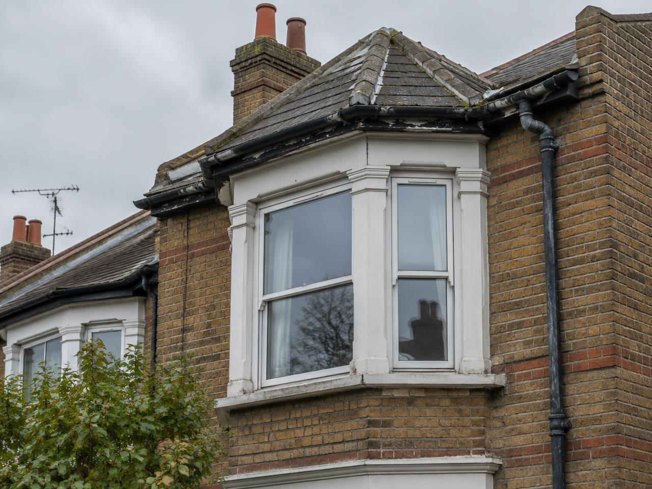 Weathered roof and external details on a South London period home